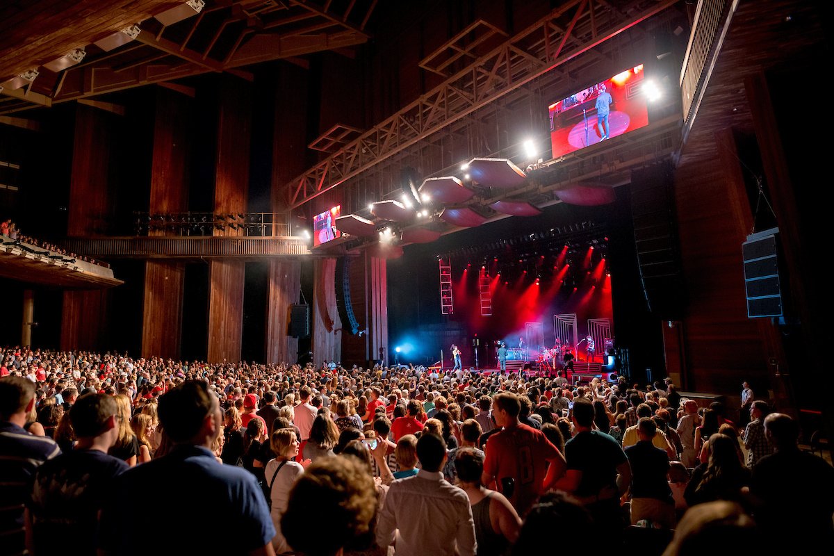 Photo of a large audience enjoying a show at Wolf Trap