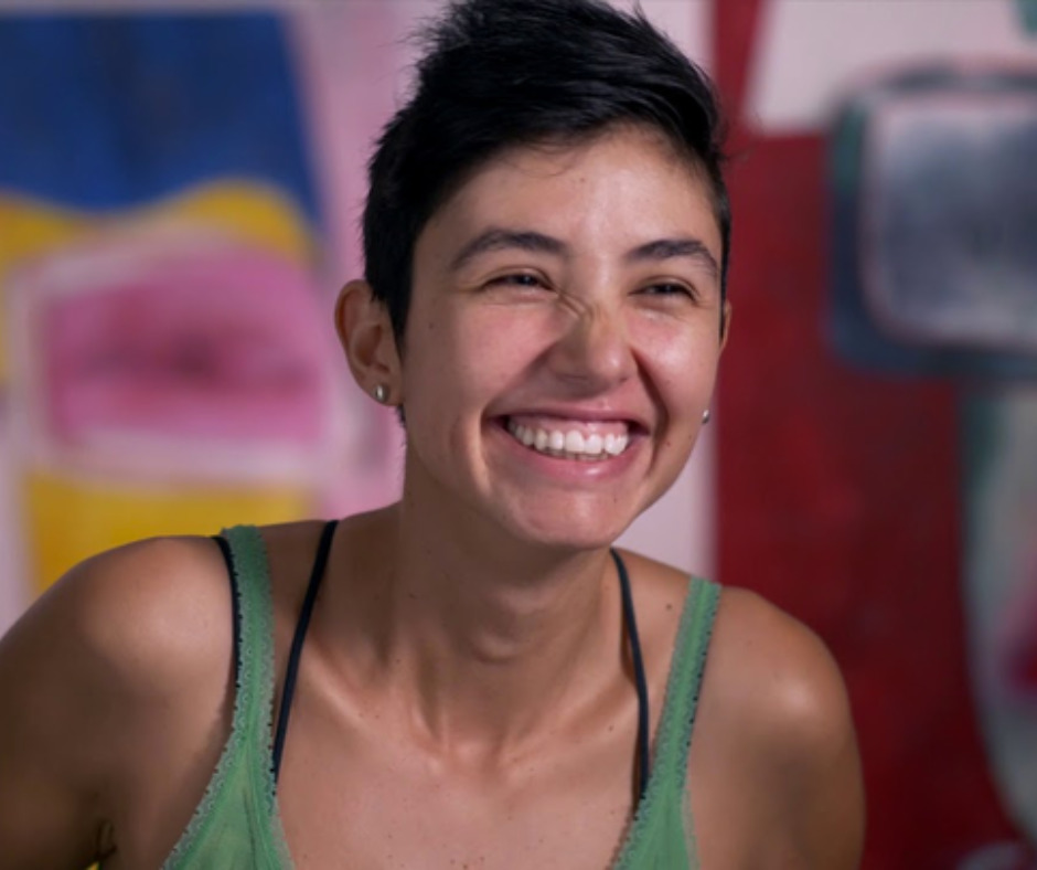 Juliana Vallejo Smiling at Camera wearing green top