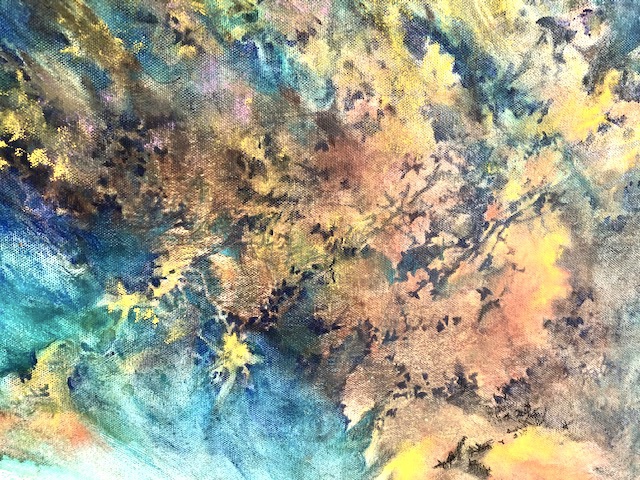 A painting by artist Pat Macintyre features blue, orange, and yellow colors in the form of abstract leaves.
